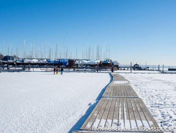 TechniDock aluminum docks installed on ice at marina in winter