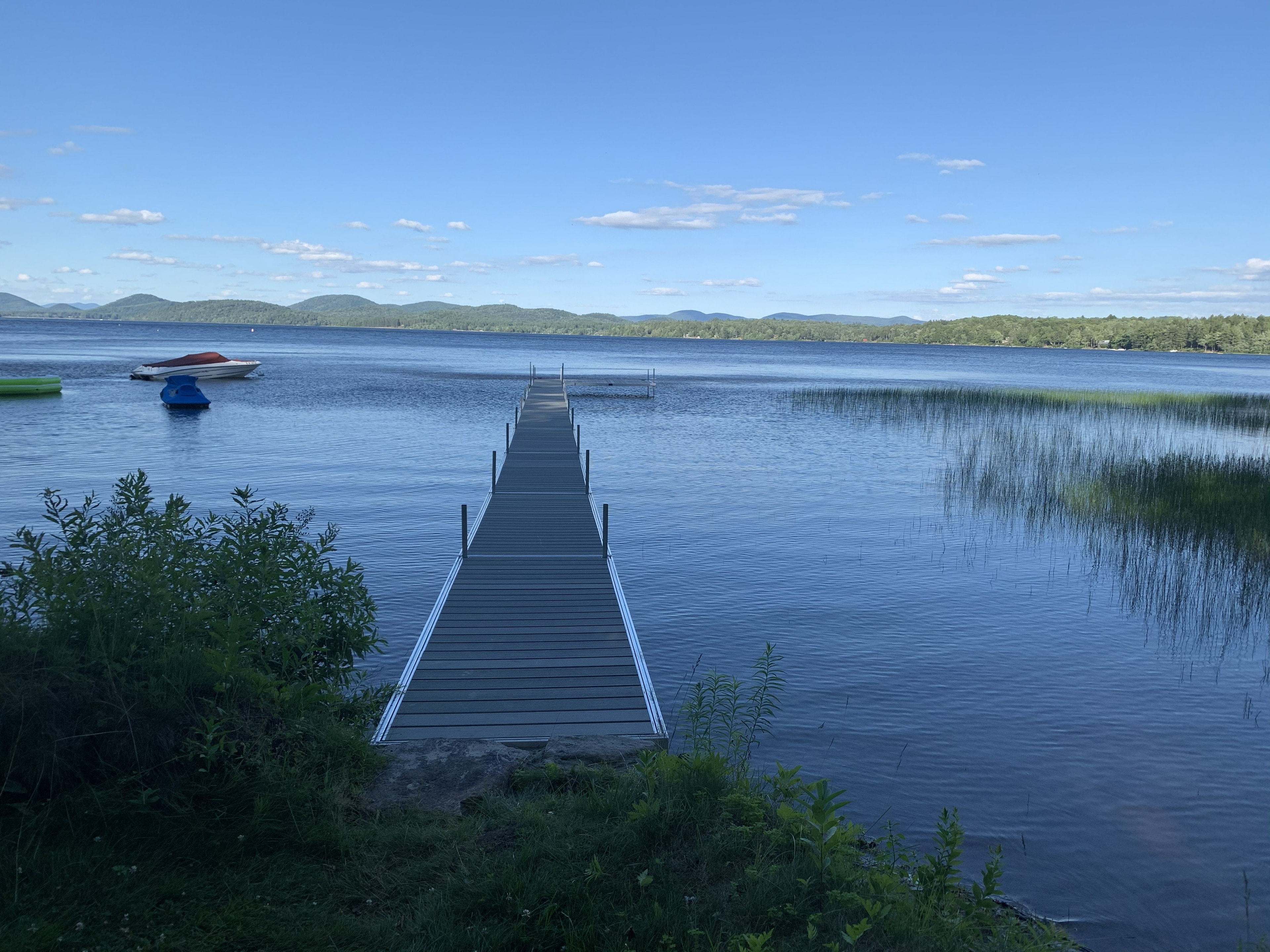 TechniDock long stationary dock extending into calm water