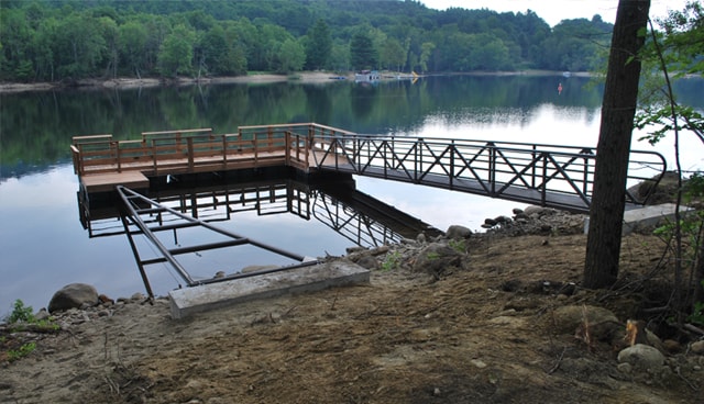 TechniDock steel frame floating dock and aluminum gangway on lake
