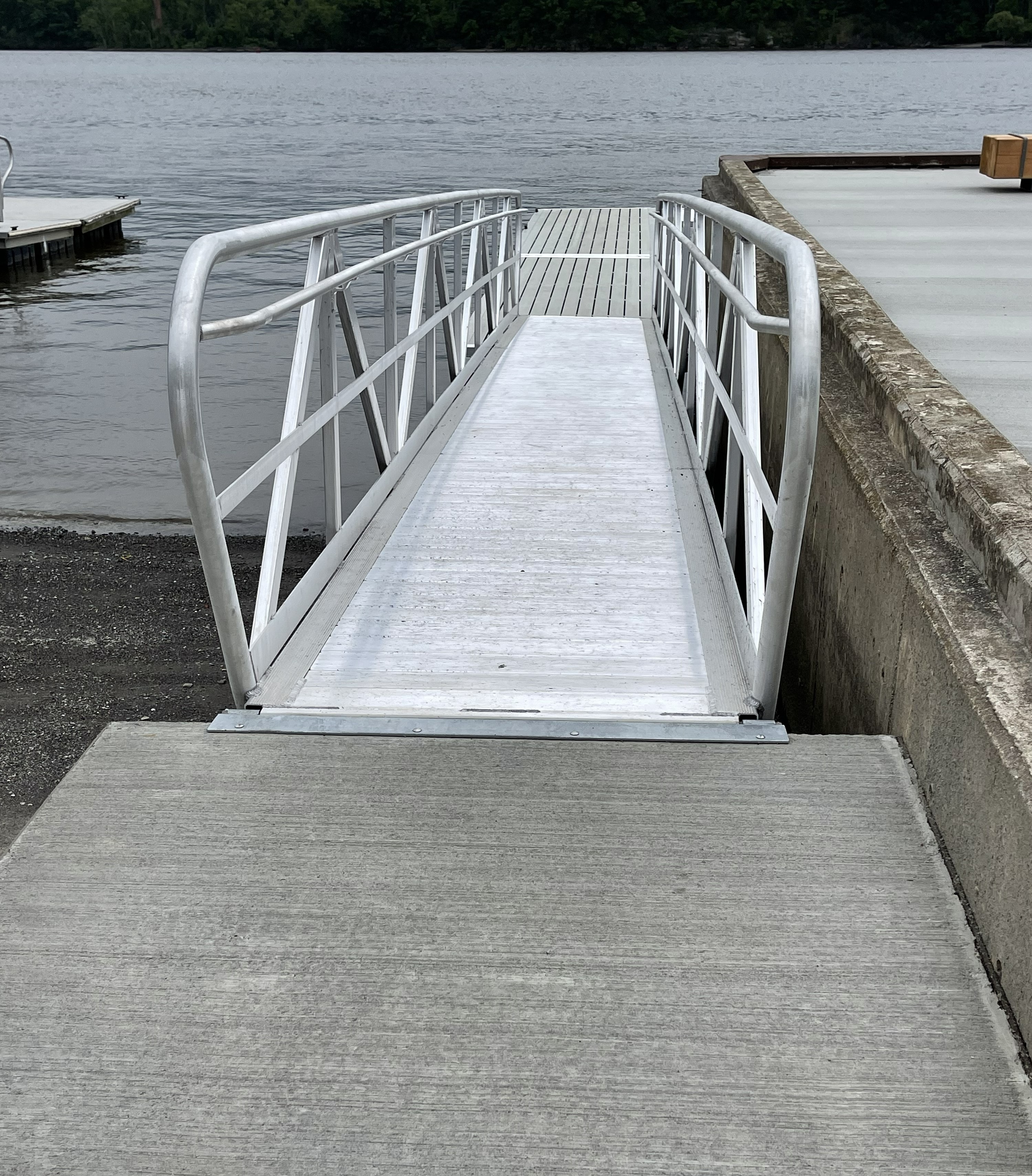 TechniDock aluminum gangway connecting seawall to floating dock