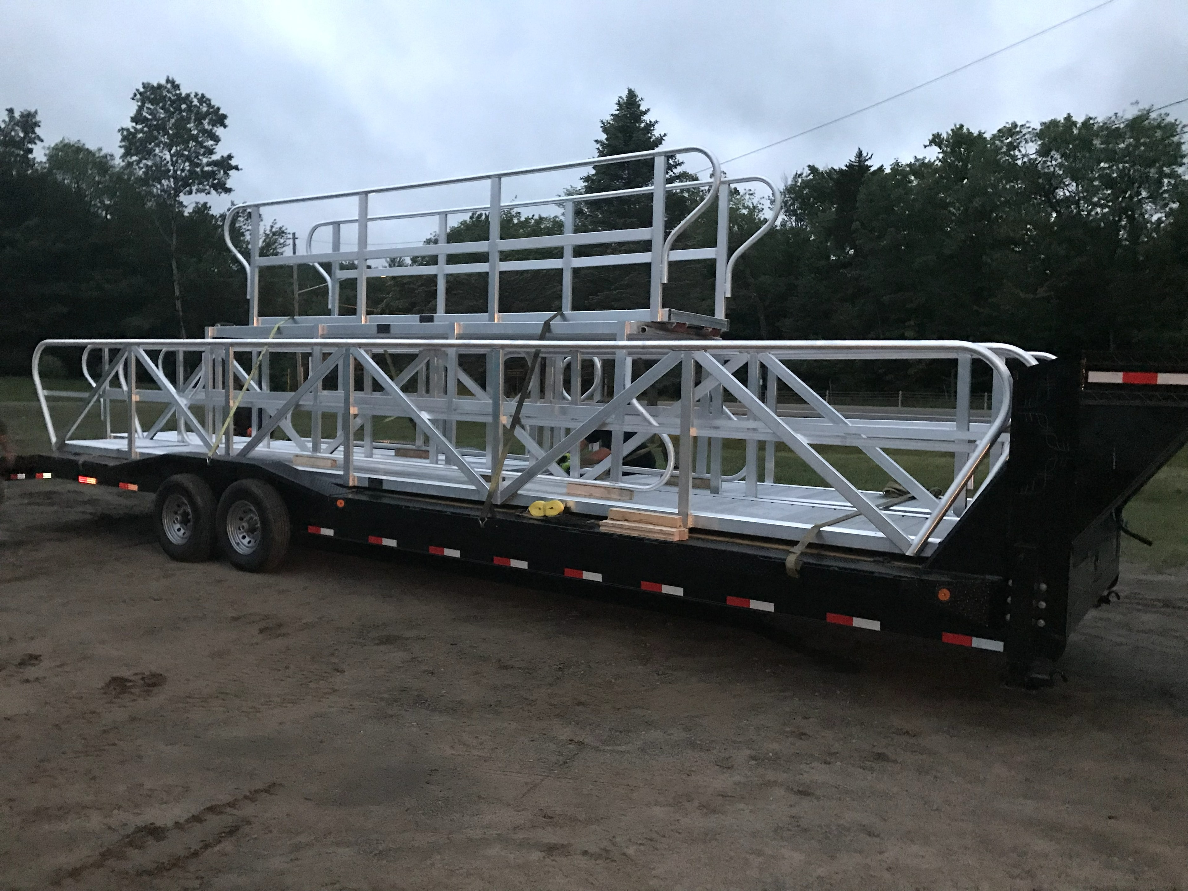 TechniDock aluminum gangways loaded on flatbed trailer for delivery